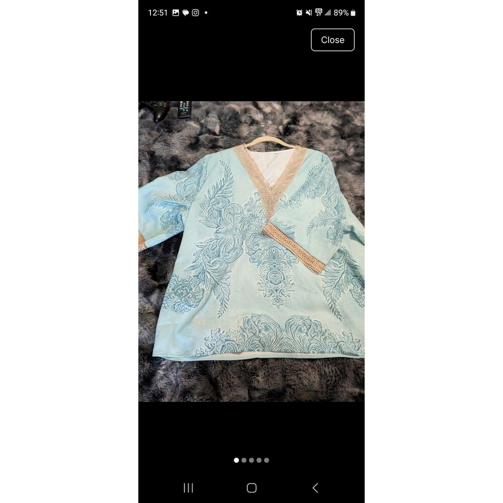 Womens soft and beautiful top with no label.